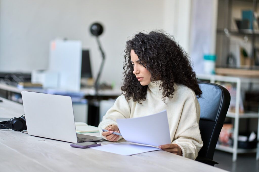 photo young business woman working on a self-billing invoice